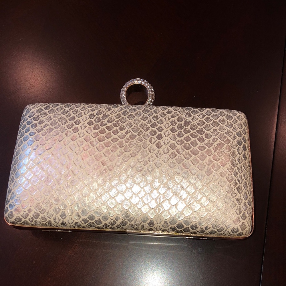 Snakeskin gold clutch with diamond ring